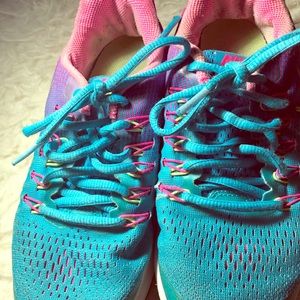 Nike sneaker shoes that are blue, and pink! :)